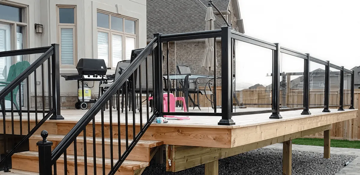 Handrail installation on a deck staircase for safety and code compliance in Anchorage, AK